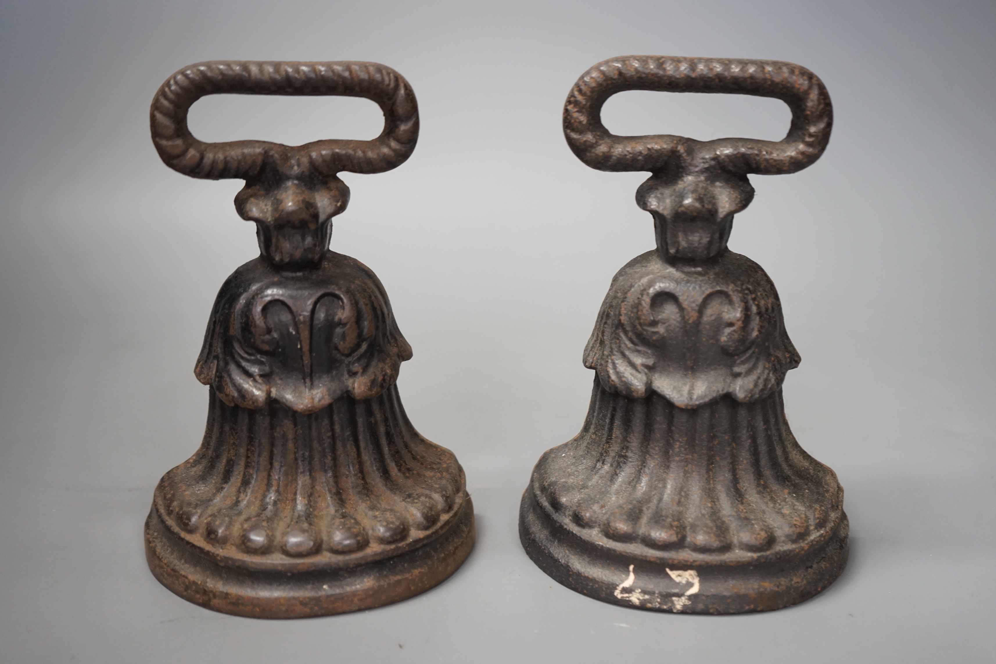 Two decorative matched pair Victorian cast iron doorstops, tallest 18cm